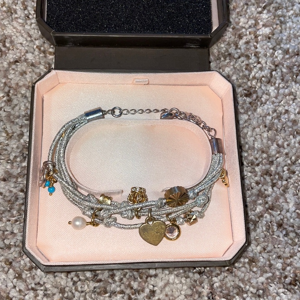 Silver juice couture charm bracelet with gold detail